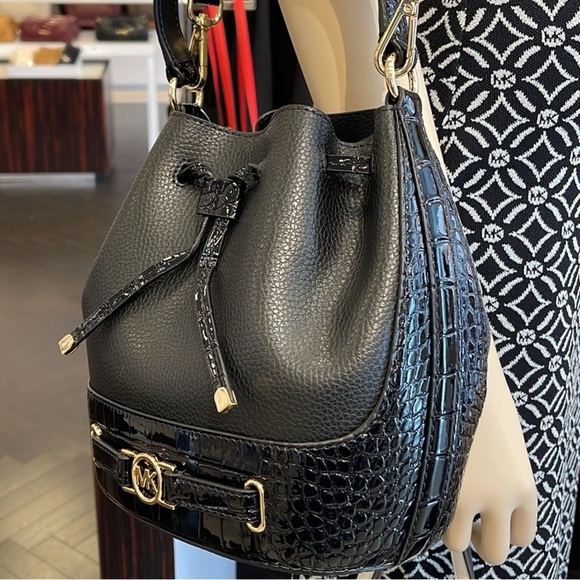 Michael Kors Handbags - MICHAEL KORS 
Reed Medium Pebbled Leather Belted Bucket Messenger Satchel Crossb
